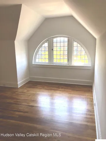 a view of a chairs and table in a room