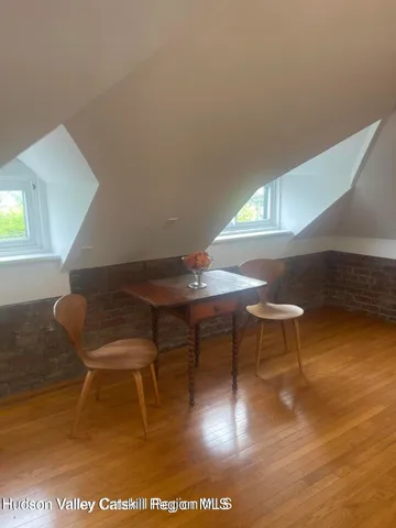 a view of a sink a washer and dryer next to a window