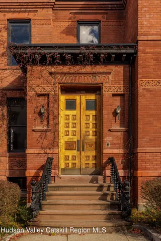 a front view of a house with a door