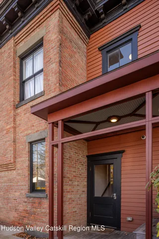 a brick building with a large door