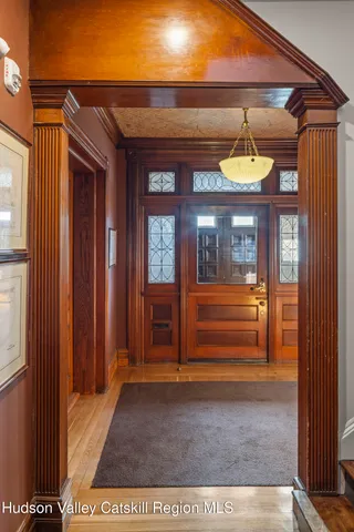 a front view of a house with a glass door