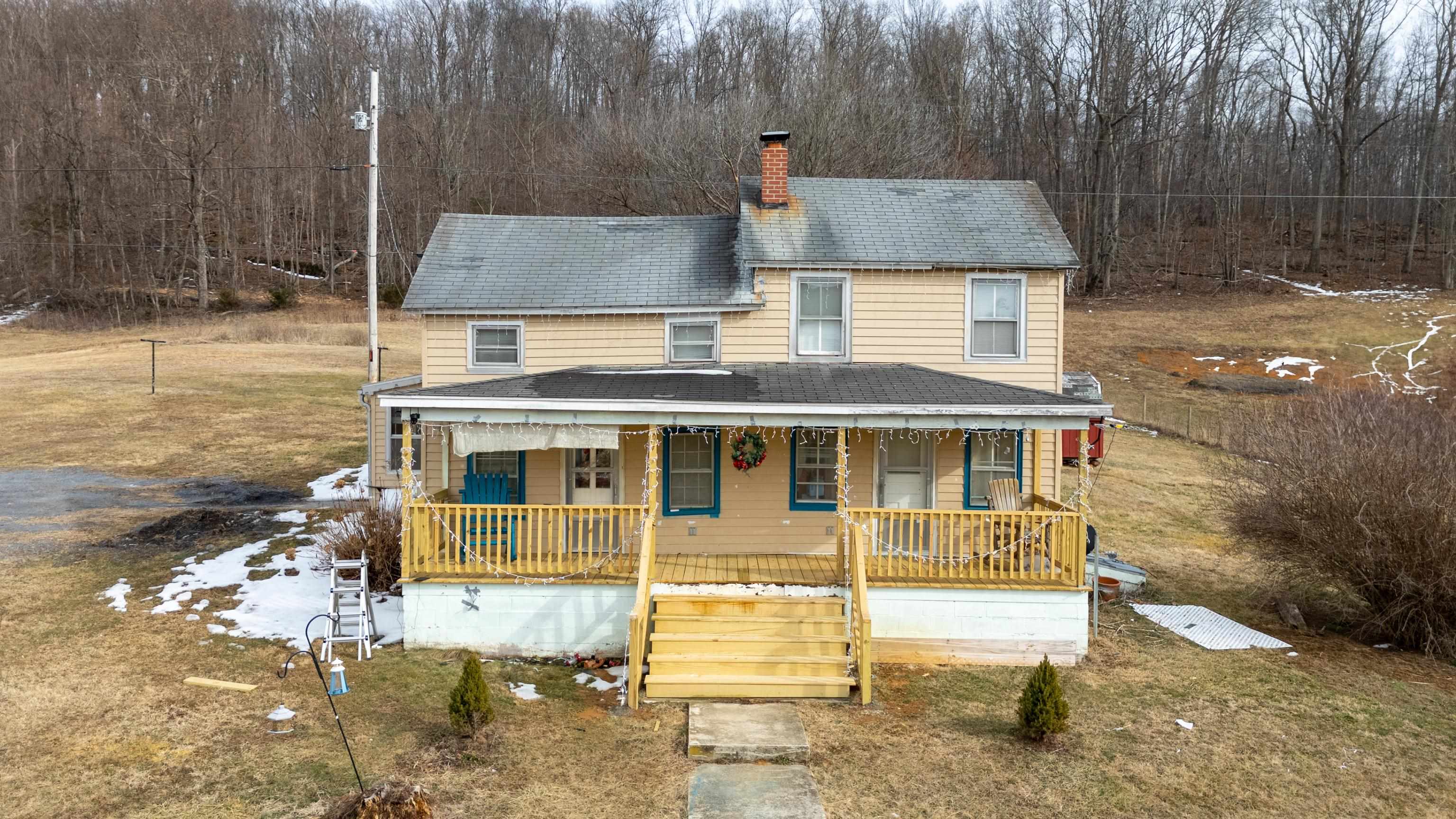 a aerial view of a house with a swimming pool