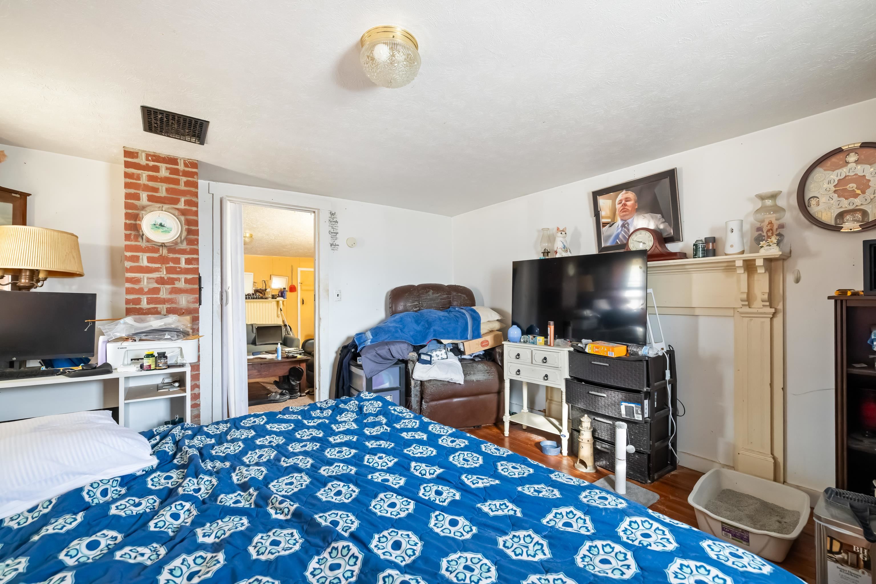 394 Ridge Road Raphine, VA 24472 - Photo 19 of 46 a bedroom with a bed and a flat screen tv