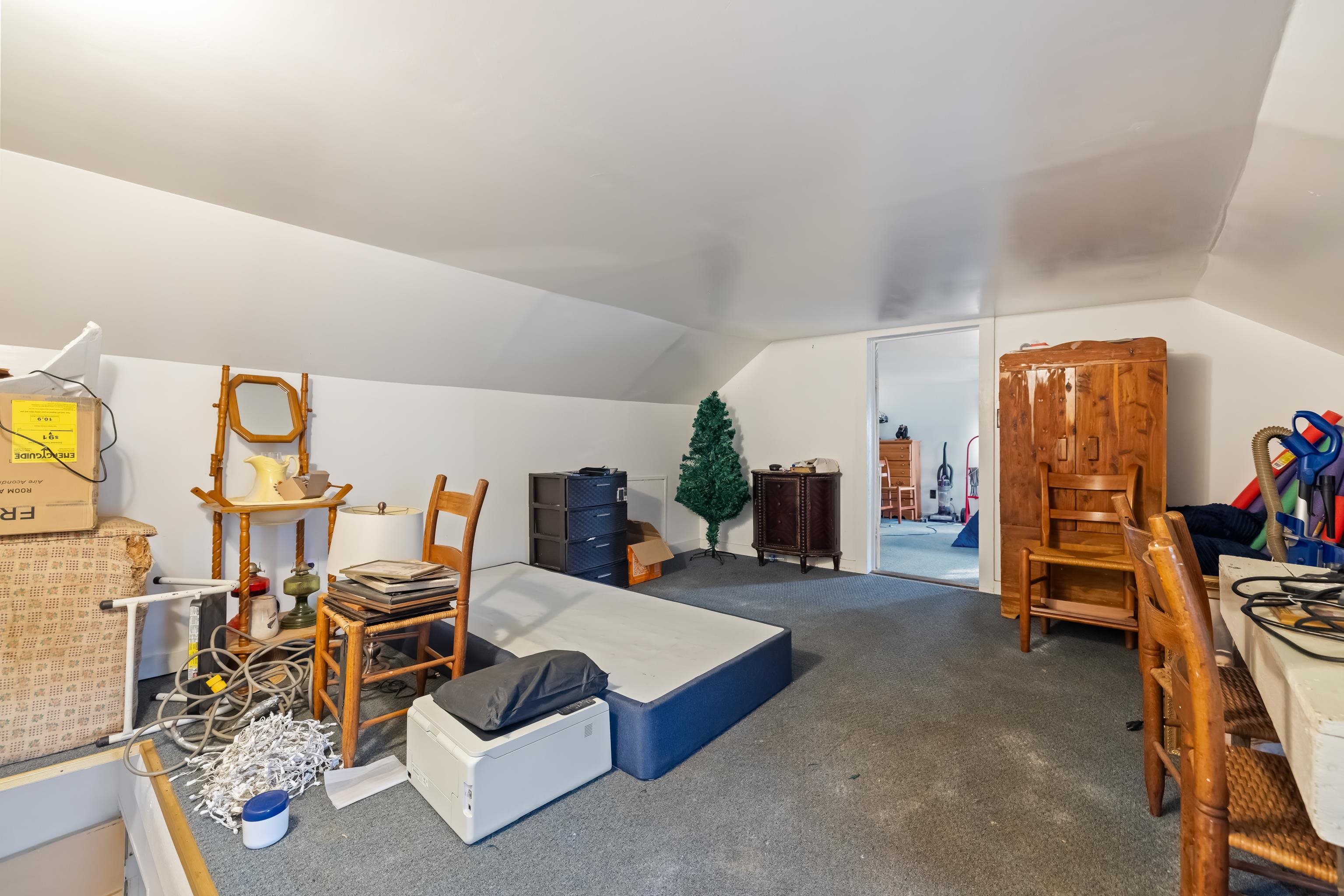 394 Ridge Road Raphine, VA 24472 - Photo 21 of 46 a living room with furniture a rug and gym equipment