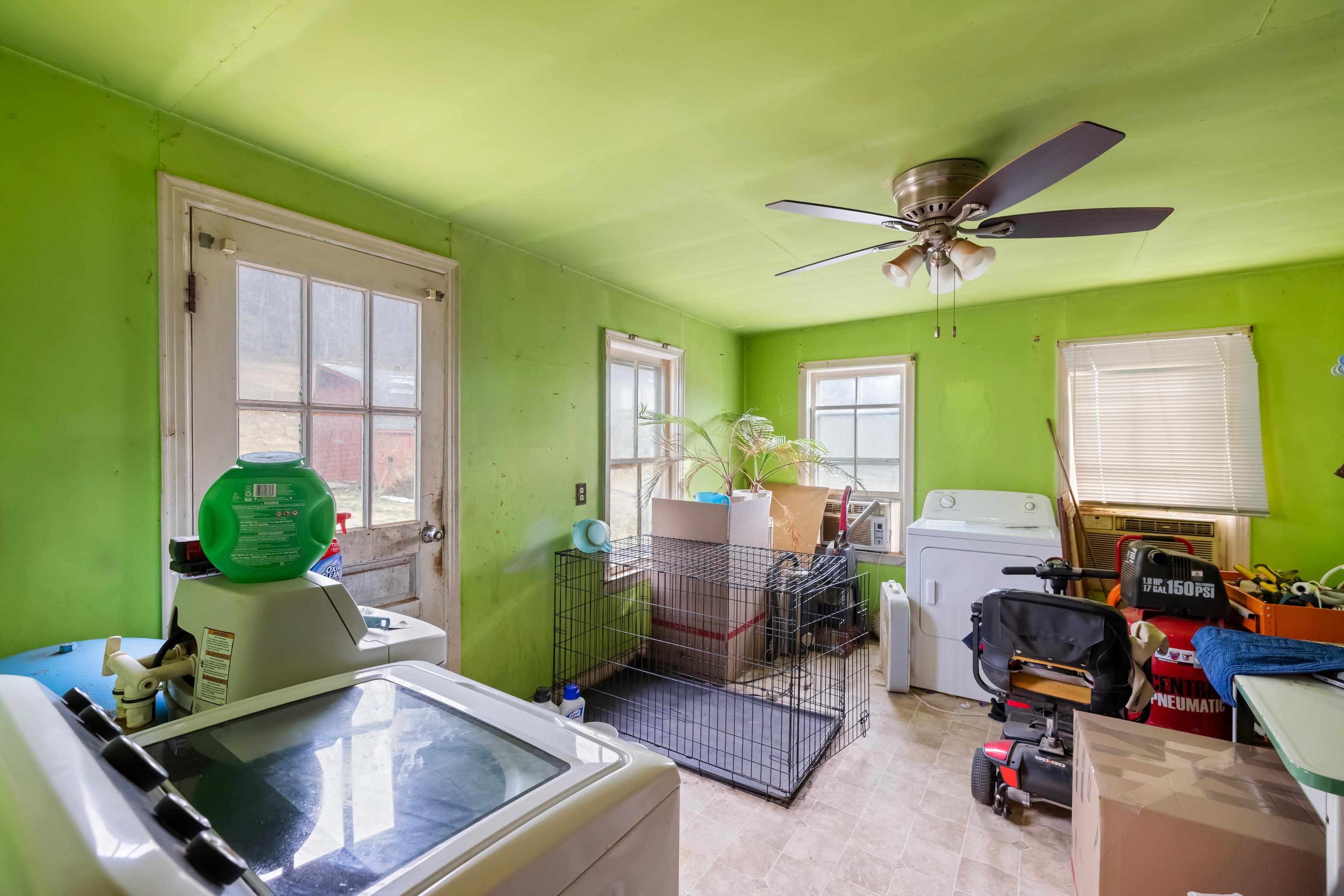 394 Ridge Road Raphine, VA 24472 - Photo 25 of 46 a living room with furniture and a window