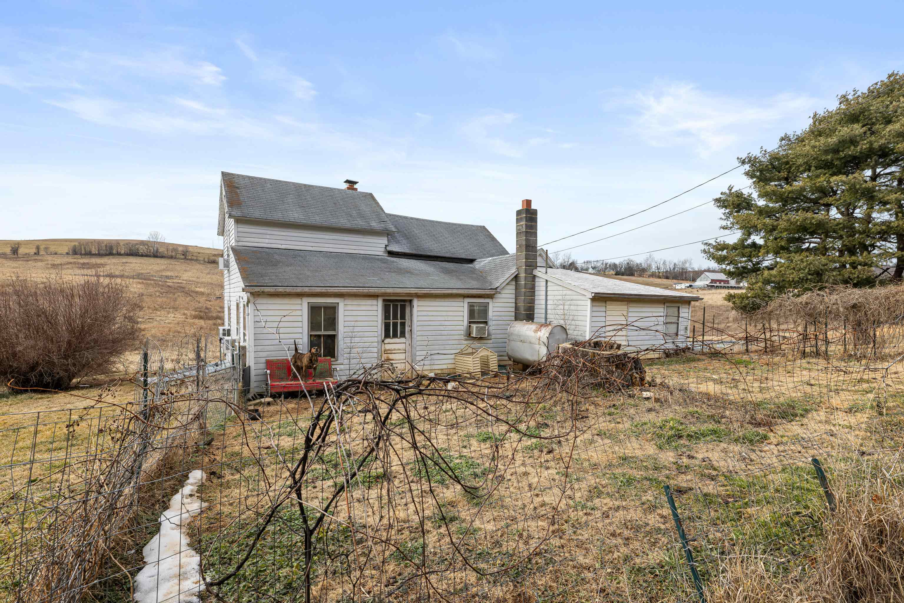 394 Ridge Road Raphine, VA 24472 - Photo 27 of 46 a front view of house with yard and trees in the background