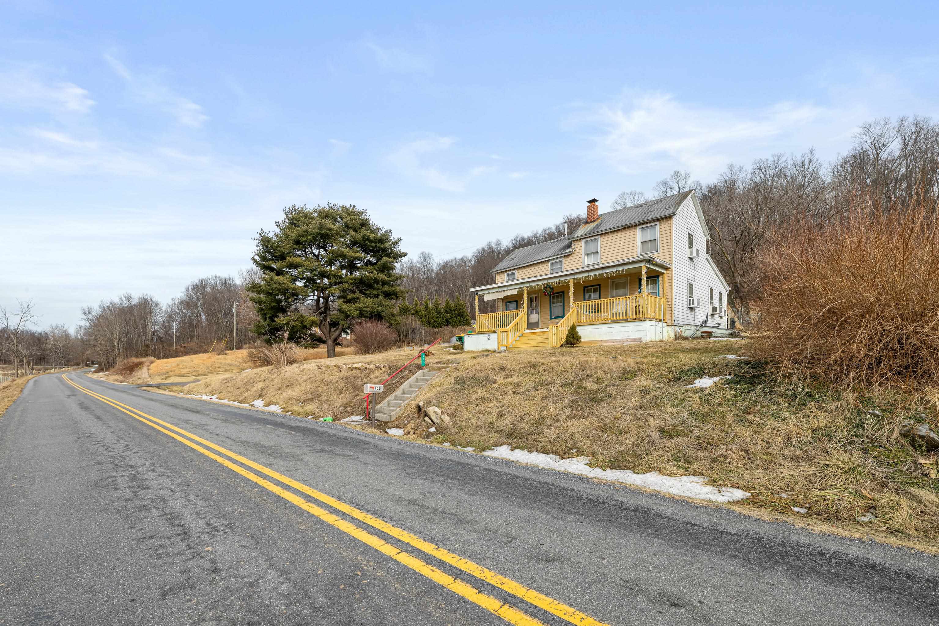 394 Ridge Road Raphine, VA 24472 - Photo 3 of 46 a front view of a house with a yard
