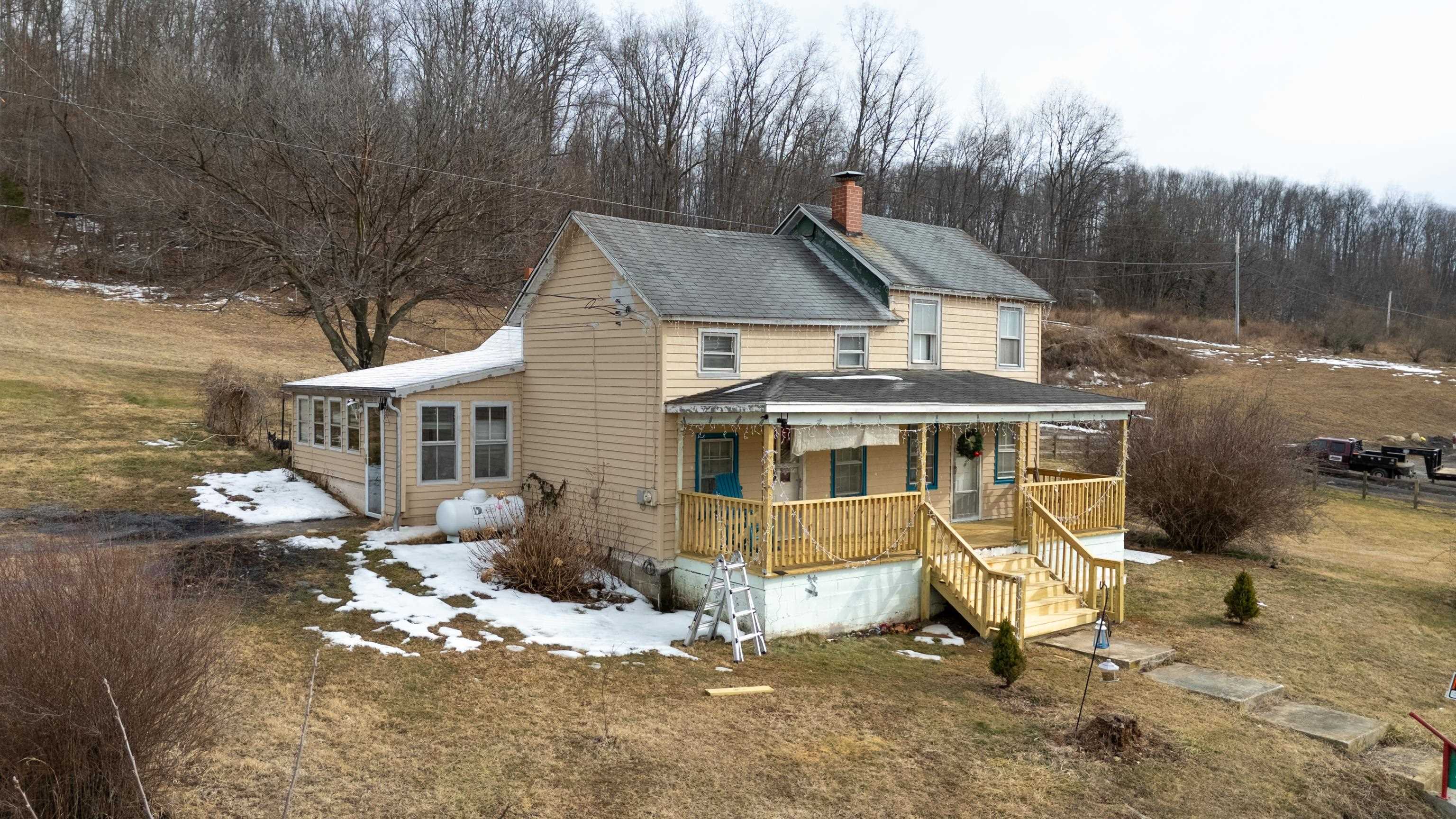 394 Ridge Road Raphine, VA 24472 - Photo 36 of 46 an aerial view of a house with a yard
