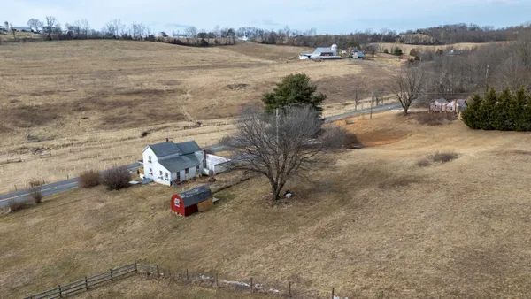 a view of a backyard of a house