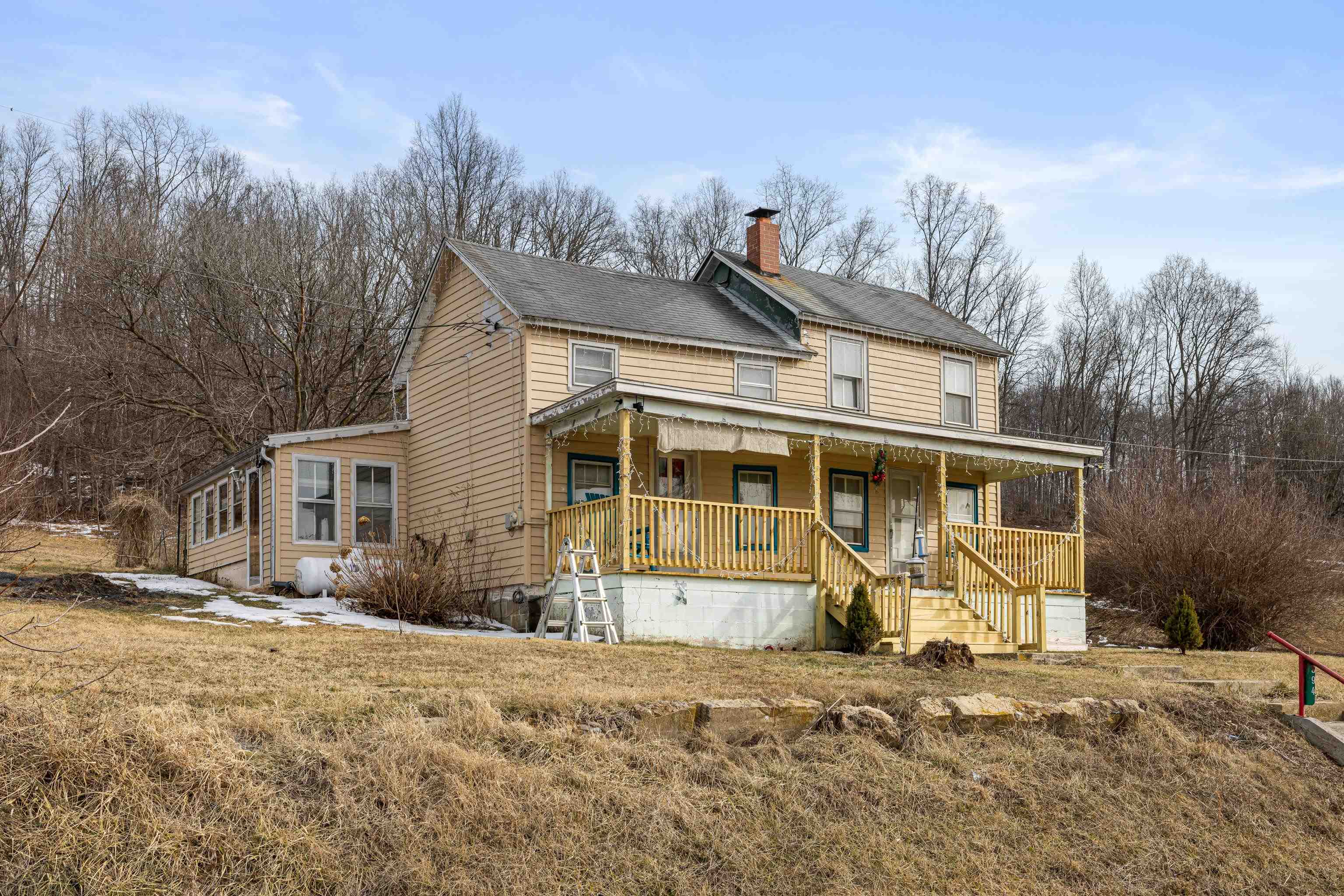 394 Ridge Road Raphine, VA 24472 - Photo 8 of 46 a front view of a house with a yard and garage