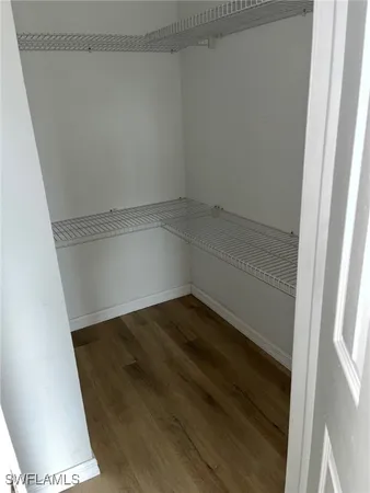 a view of small space with racks on the wall