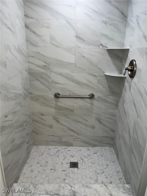 16881 Davis Road, Unit 713 Fort Myers, FL 33908 - Photo 19 of 29 a bathroom with a shower