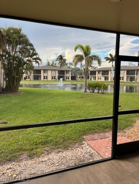 16881 Davis Road, Unit 713 Fort Myers, FL 33908 - Photo 20 of 29 a view of a fountain in front of a house