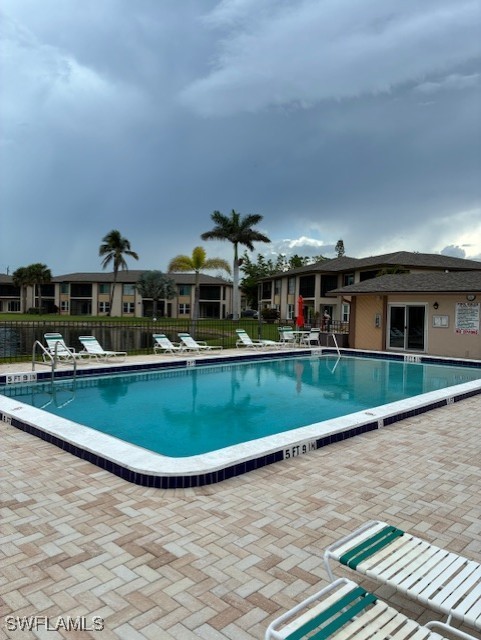 16881 Davis Road, Unit 713 Fort Myers, FL 33908 - Photo 28 of 29 an aerial view of a house with a swimming pool