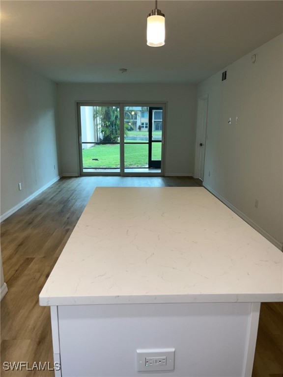 16881 Davis Road, Unit 713 Fort Myers, FL 33908 - Photo 8 of 29 a view of an empty room with a window