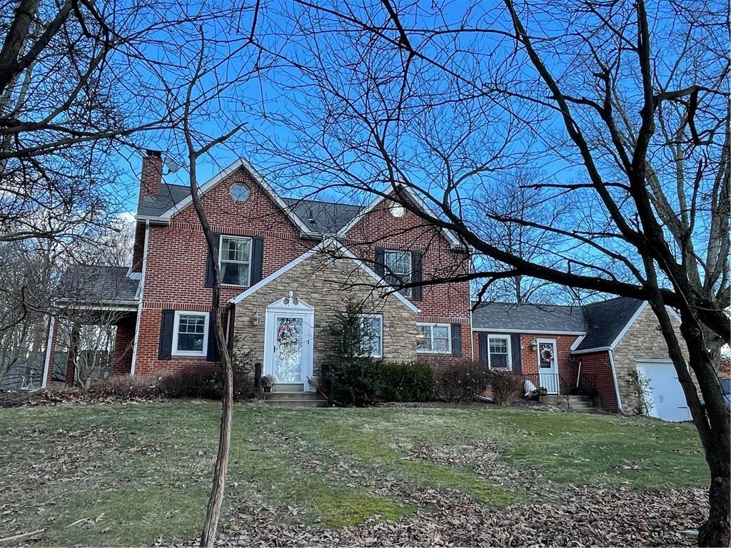 233 Teepee Road Canonsburg, PA 15317 - Photo 1 of 25 a house that has a tree in front of the house