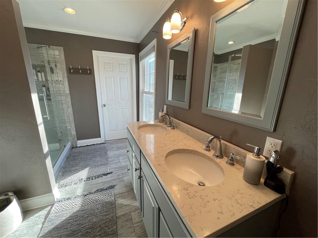 233 Teepee Road Canonsburg, PA 15317 - Photo 16 of 25 a bathroom with a granite countertop sink and a mirror