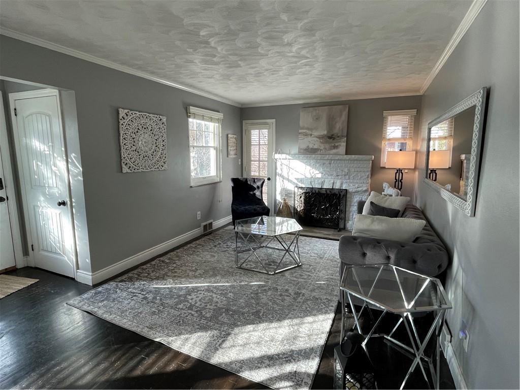 233 Teepee Road Canonsburg, PA 15317 - Photo 3 of 25 a living room with furniture and a fireplace