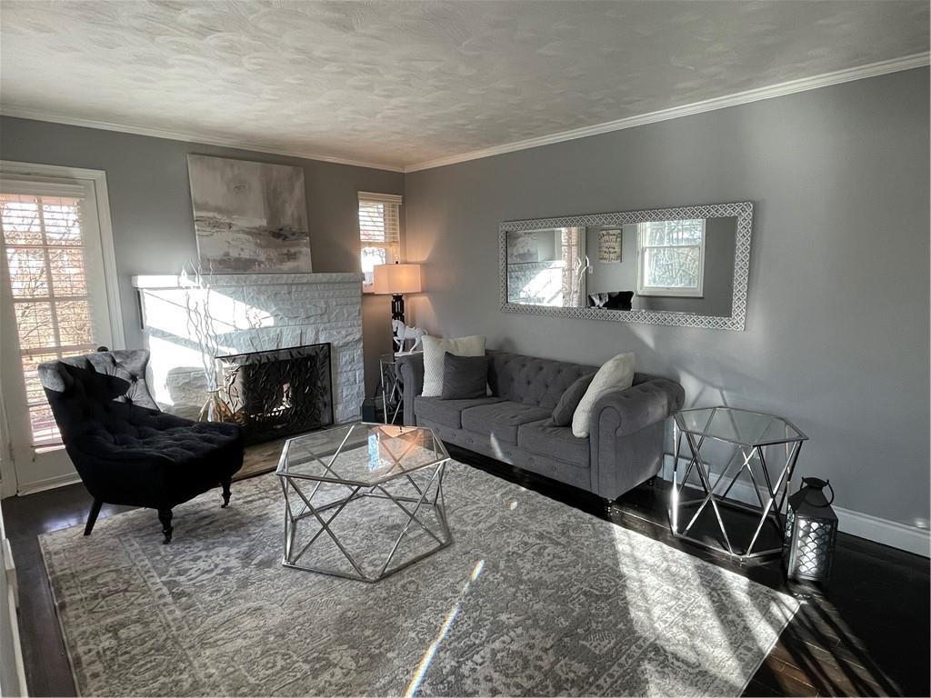 233 Teepee Road Canonsburg, PA 15317 - Photo 4 of 25 a living room with furniture and a fireplace