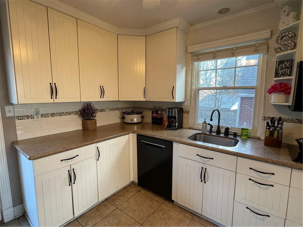 233 Teepee Road Canonsburg, PA 15317 - Photo 9 of 25 a kitchen with appliances cabinets and a sink