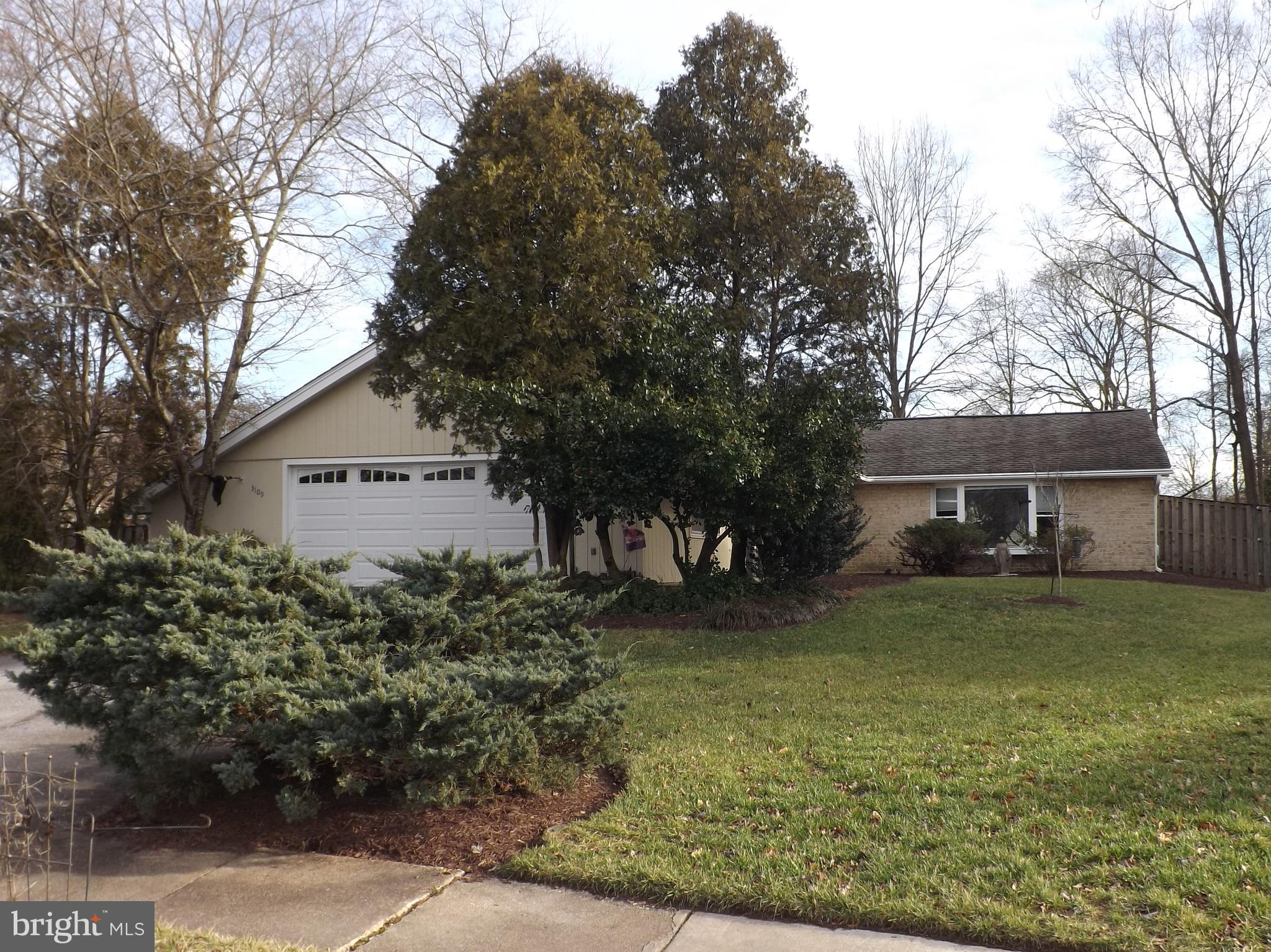 a view of a house with a garden