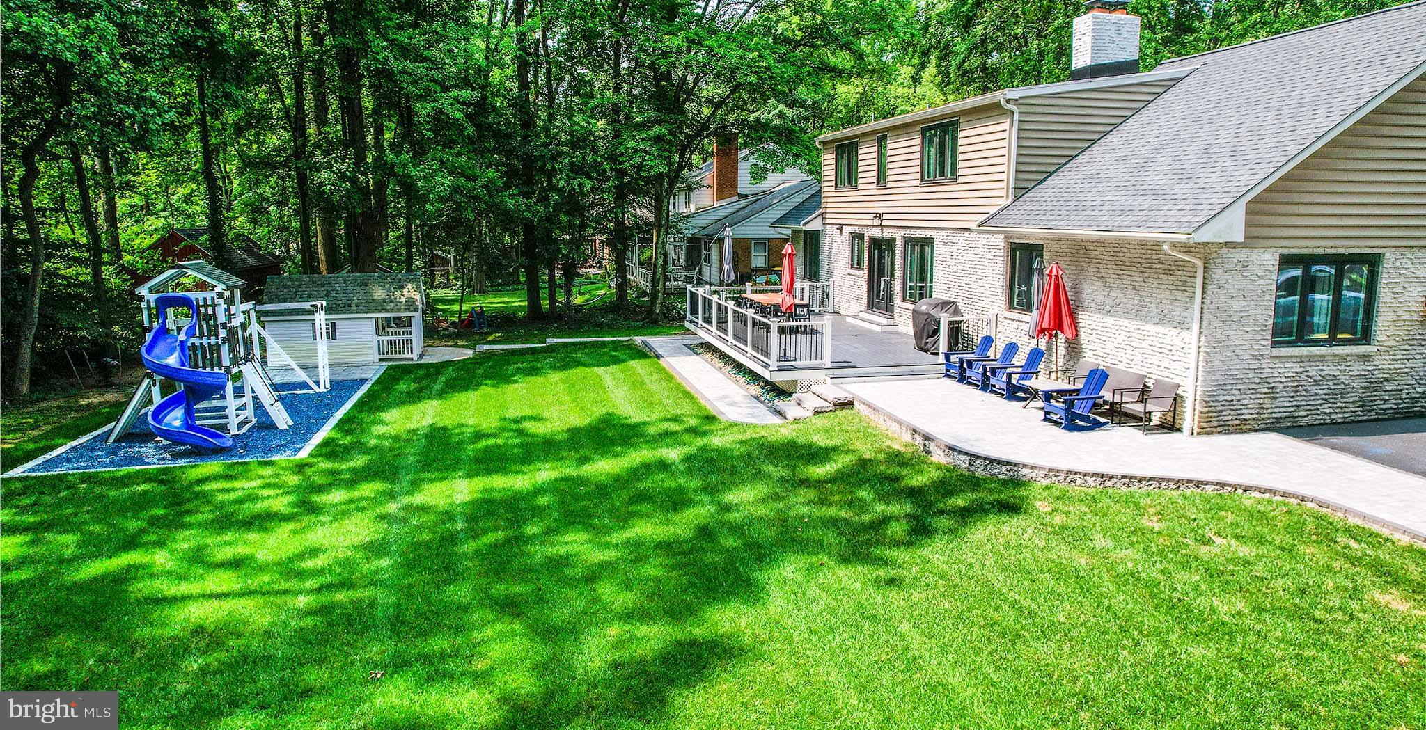 122 Hitching Post Drive Wilmington, DE 19803 - Photo 11 of 64 a view of a house with a yard patio and slide