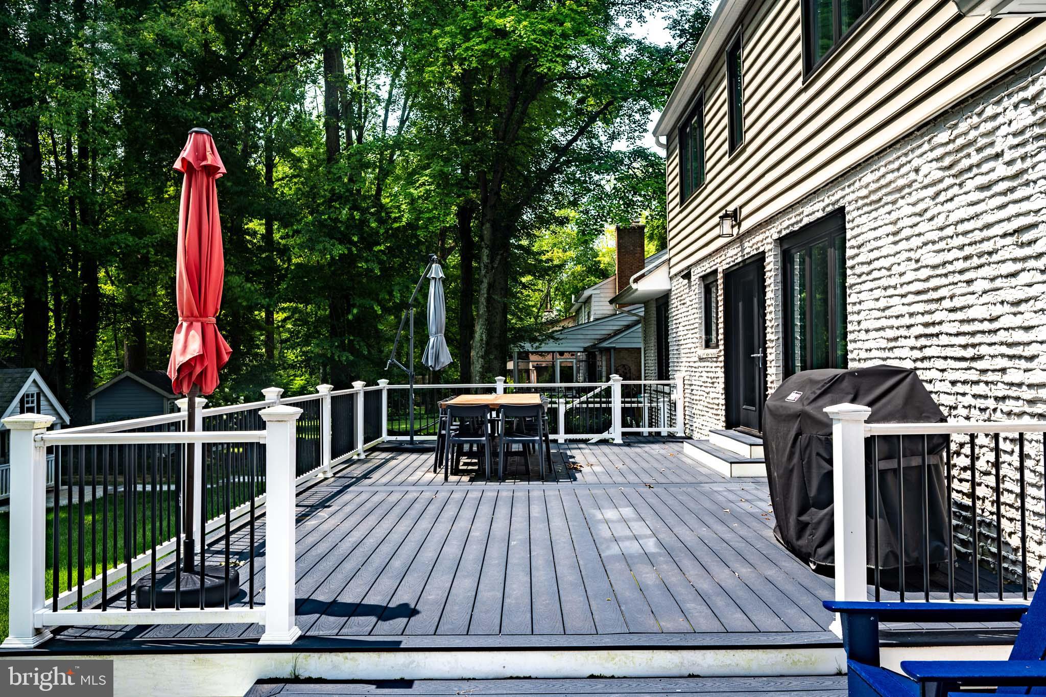 122 Hitching Post Drive Wilmington, DE 19803 - Photo 21 of 64 a view of outdoor sitting area with furniture and wooden deck