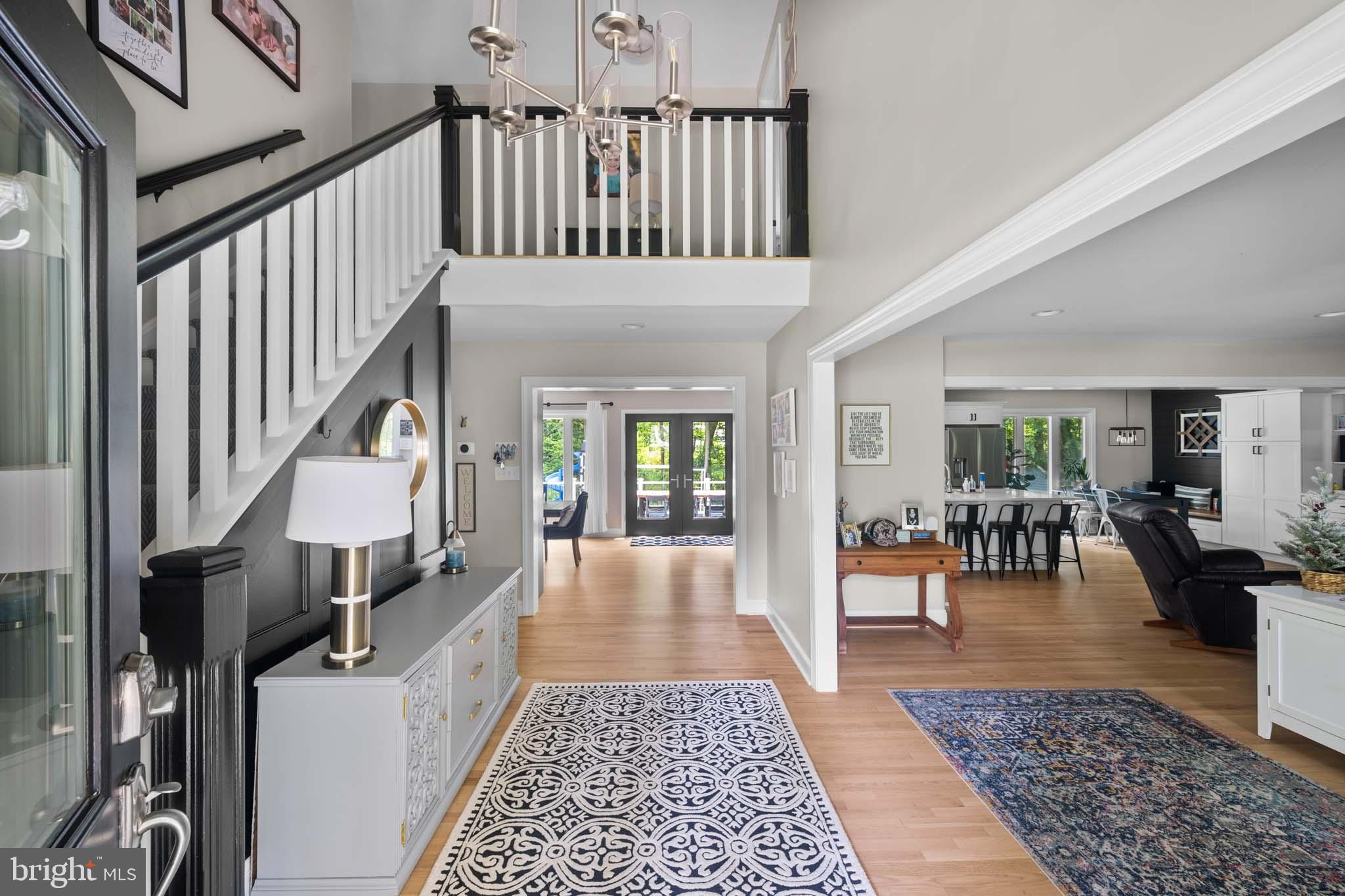 122 Hitching Post Drive Wilmington, DE 19803 - Photo 27 of 64 a view of staircase with living room and lots of furniture