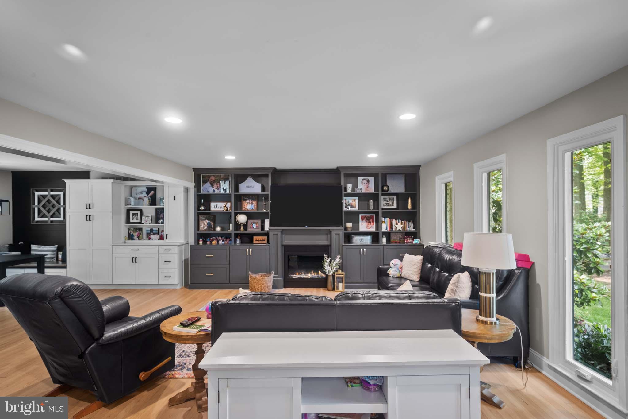 122 Hitching Post Drive Wilmington, DE 19803 - Photo 30 of 64 a living room with furniture a fireplace and a large window