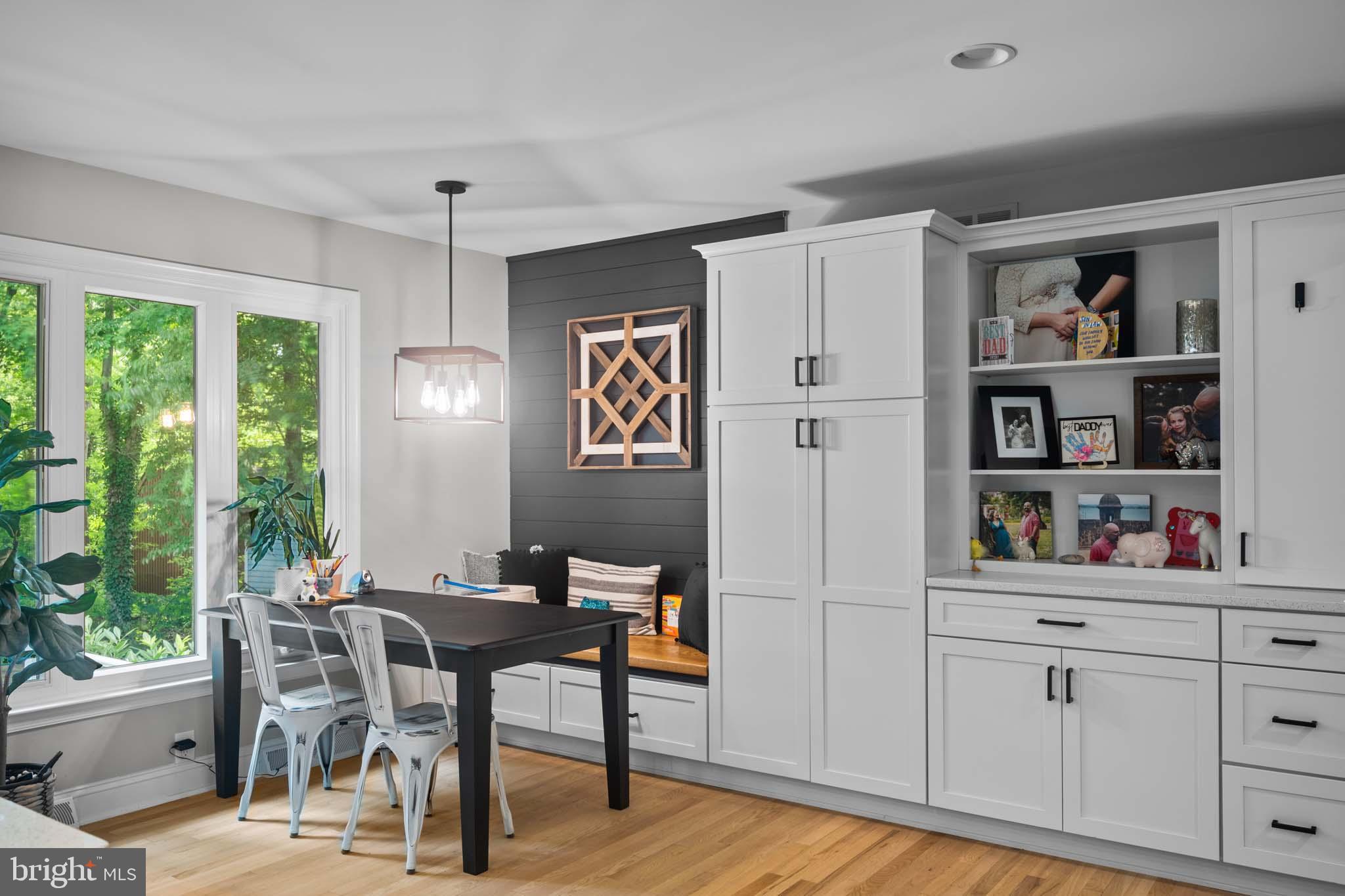 122 Hitching Post Drive Wilmington, DE 19803 - Photo 36 of 64 a view of a workspace with furniture and a potted plant