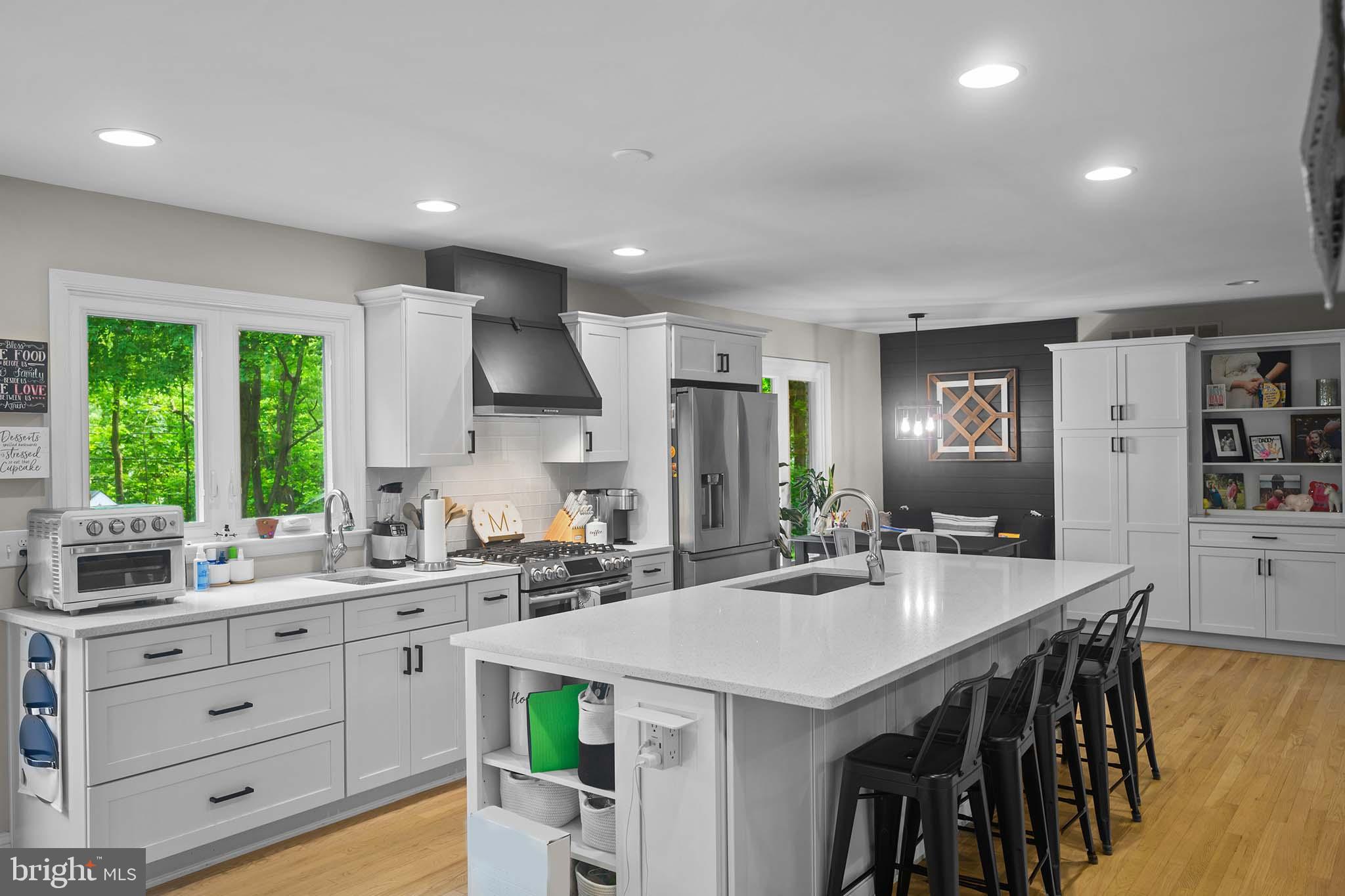 122 Hitching Post Drive Wilmington, DE 19803 - Photo 40 of 64 a kitchen with counter space dining table and chairs