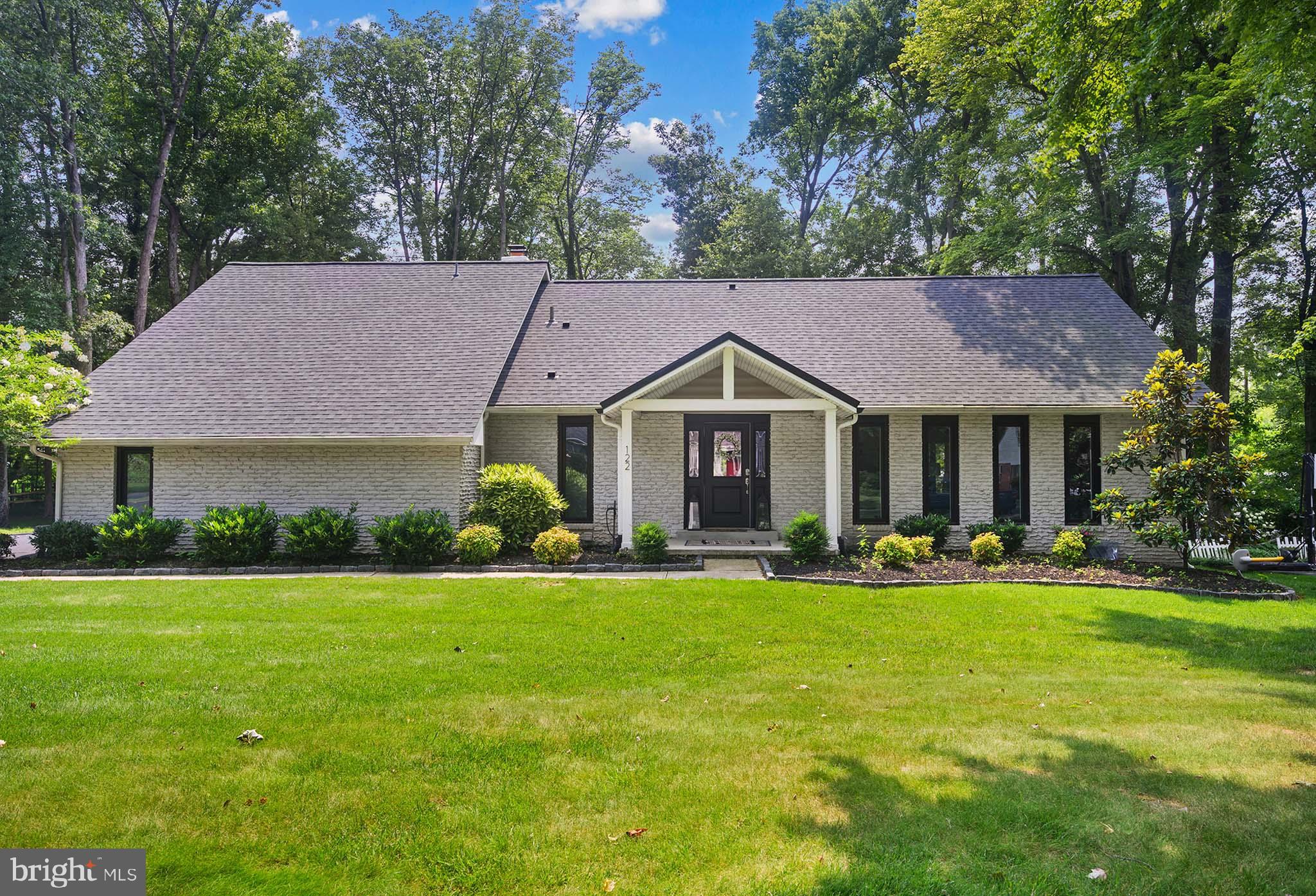 122 Hitching Post Drive Wilmington, DE 19803 - Photo 4 of 64 a front view of a house with a yard