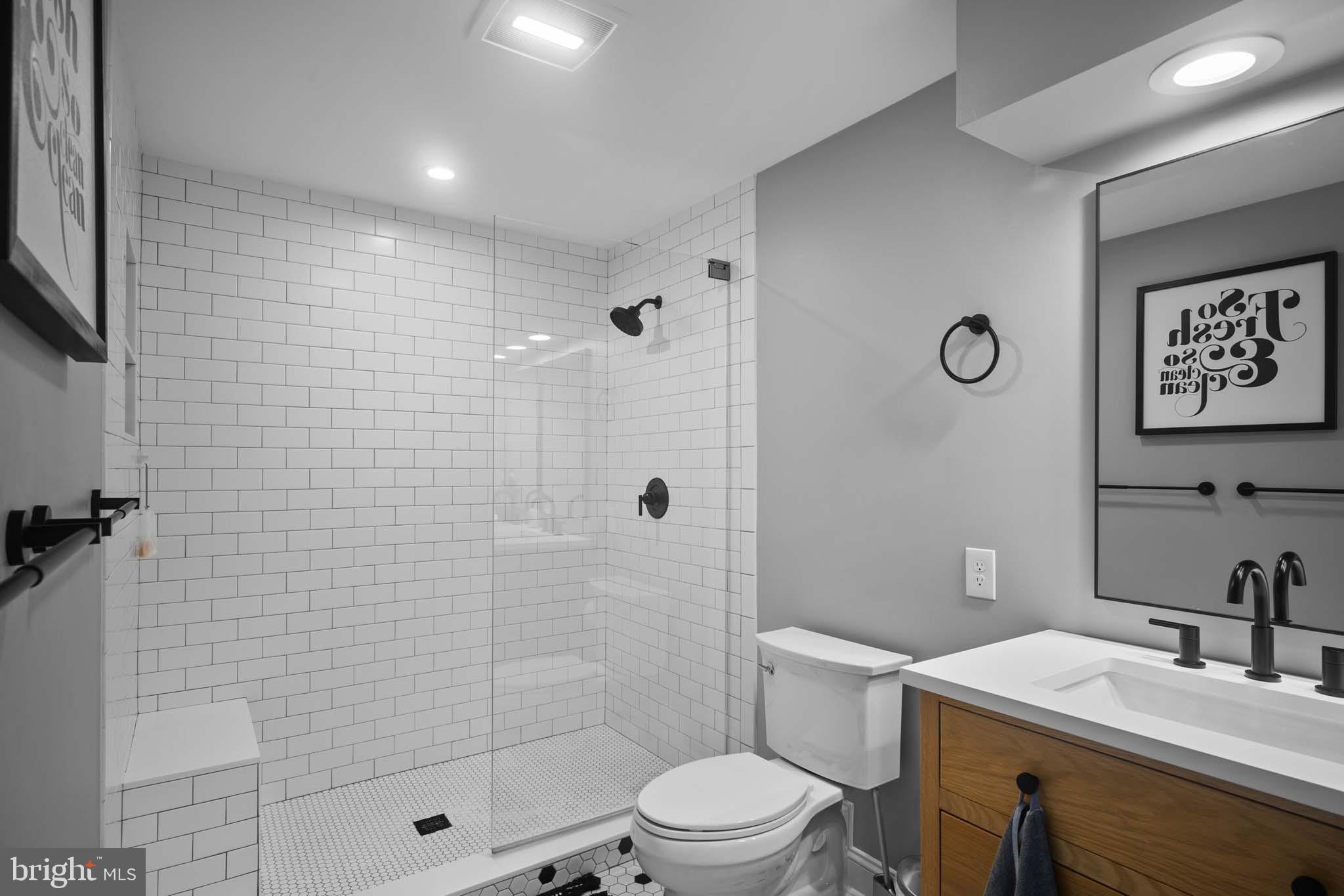 122 Hitching Post Drive Wilmington, DE 19803 - Photo 62 of 64 a bathroom with a sink a toilet and shower