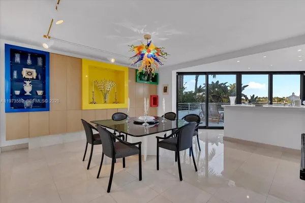 a kitchen with stainless steel appliances a stove and more cabinets