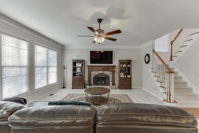 a bedroom with a bed and a fireplace
