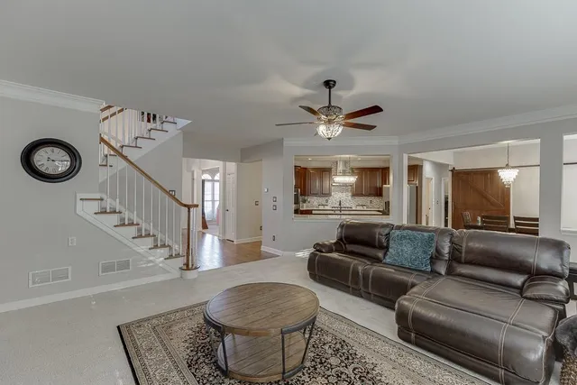 a living room with furniture and a view of living room