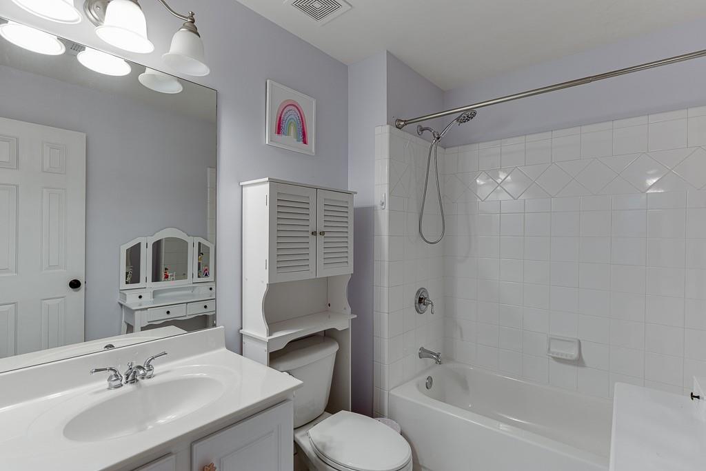1806 Asteria Court Duluth, GA 30097 - Photo 41 of 63 a bathroom with a sink toilet tub and shower