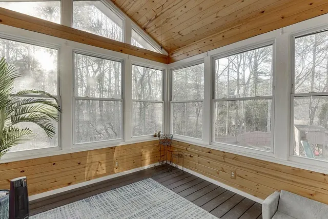 a view of an empty room with a flat screen tv