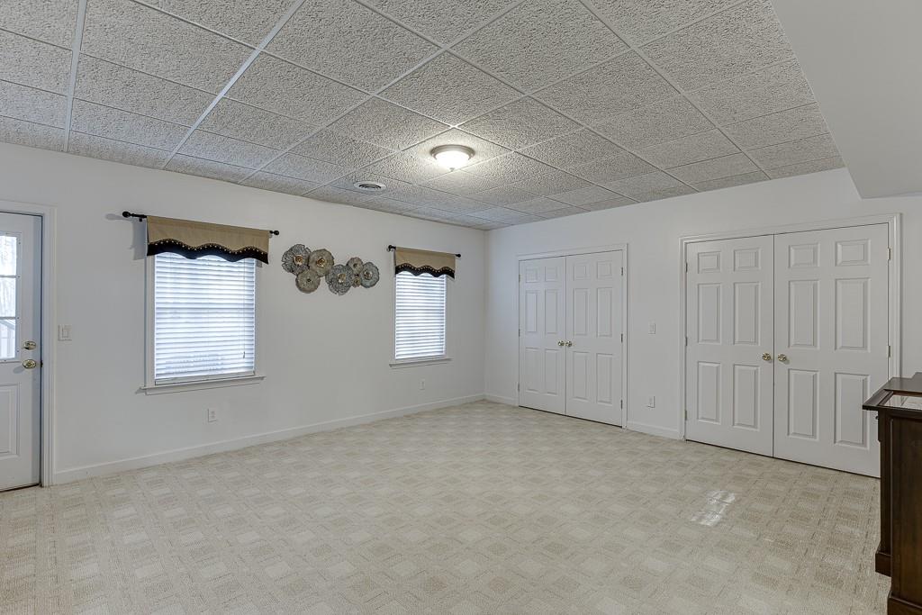 1806 Asteria Court Duluth, GA 30097 - Photo 52 of 63 an empty room with windows