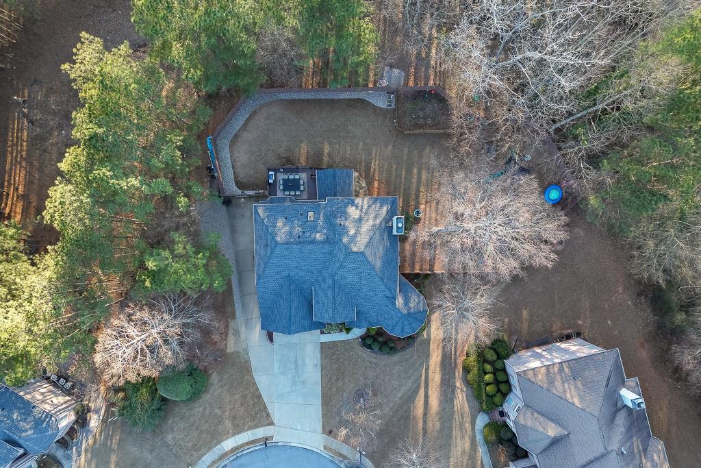 1806 Asteria Court Duluth, GA 30097 - Photo 62 of 63 an aerial view of a house with a yard basket ball court and outdoor seating