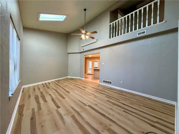 a view of an empty room and window