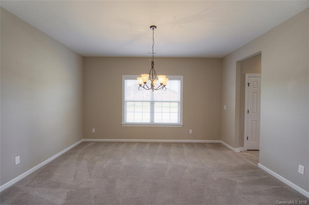 2001 Spring Rose Lane Wesley Chapel, NC 28104 - Photo 14 of 36 a room with window and a ceiling fan