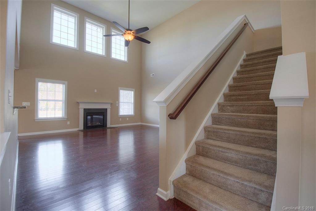 2001 Spring Rose Lane Wesley Chapel, NC 28104 - Photo 16 of 36 a view of entryway and hall with wooden floor