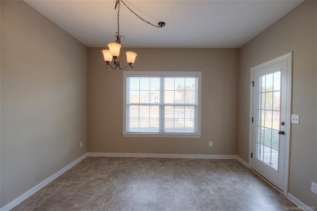 2001 Spring Rose Lane Wesley Chapel, NC 28104 - Photo 26 of 36 a view of an empty room with a window