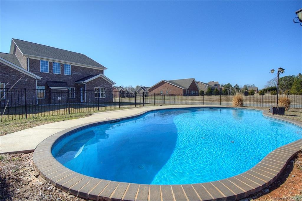 2001 Spring Rose Lane Wesley Chapel, NC 28104 - Photo 9 of 36 a view of swimming pool with seating space