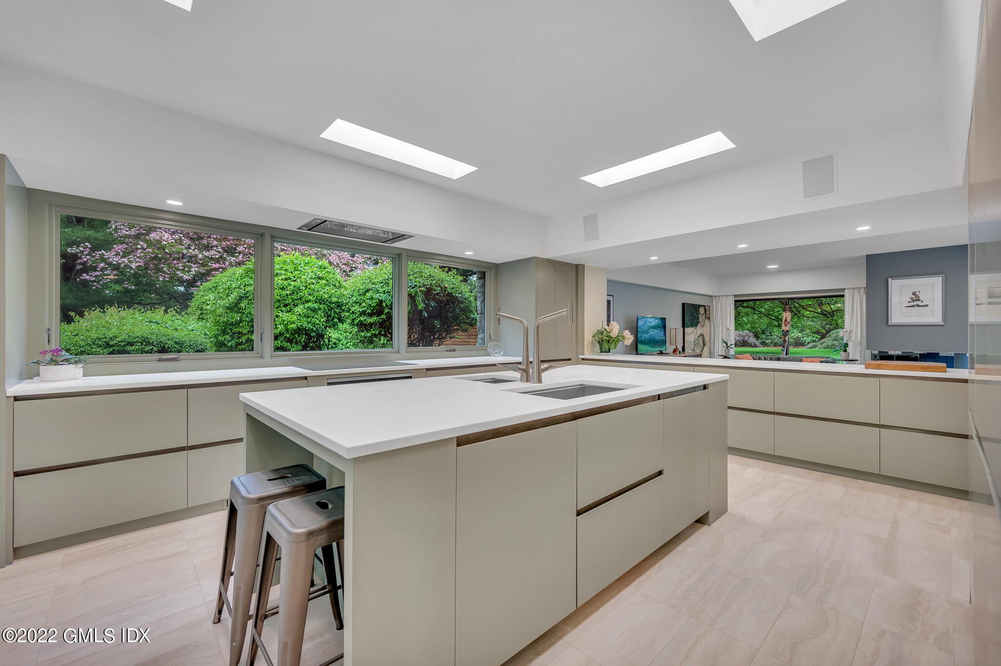 3 North Stanwich Road Greenwich, CT 06831 - Photo 14 of 35 a kitchen with kitchen island a large window in it