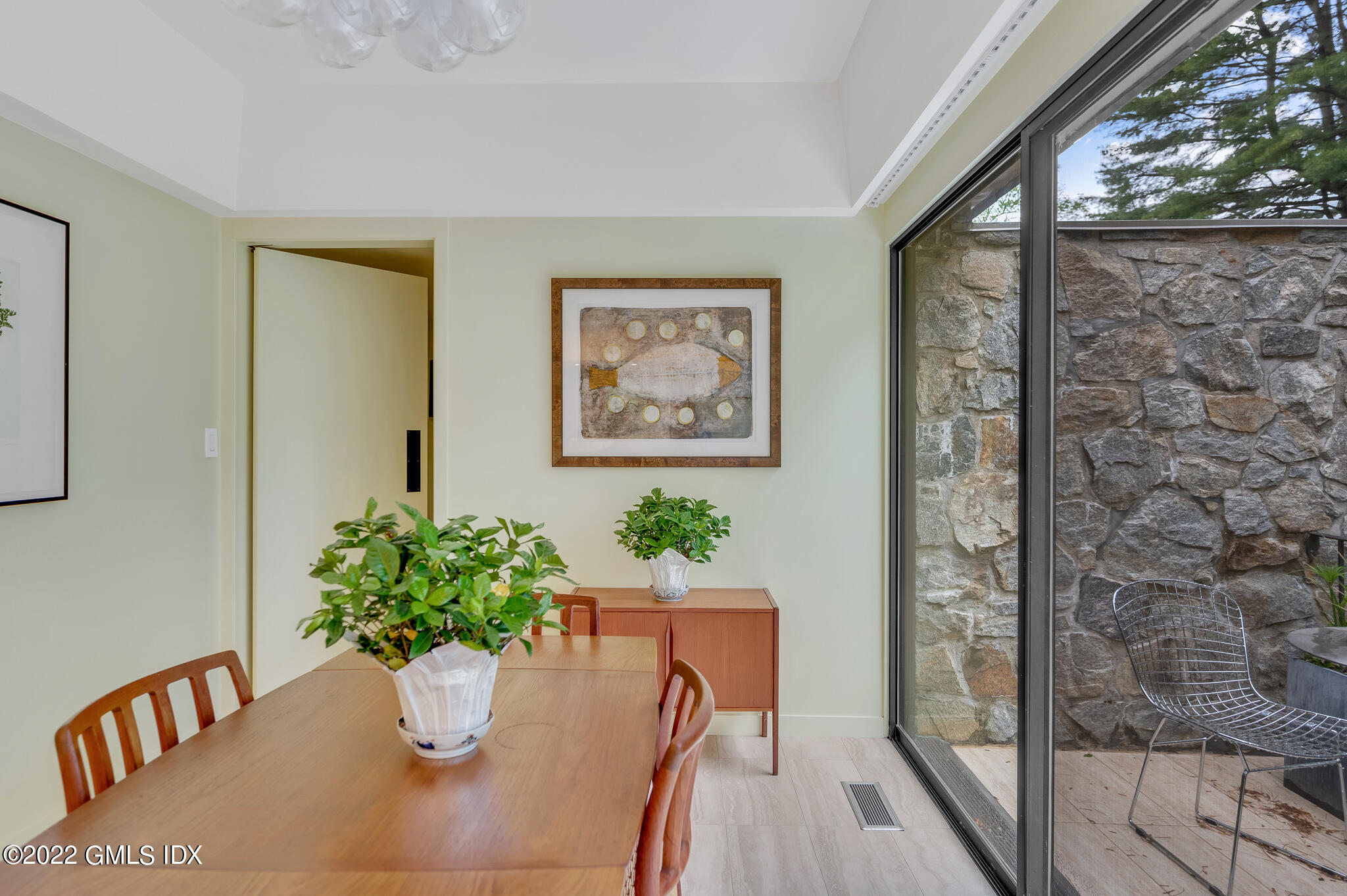 3 North Stanwich Road Greenwich, CT 06831 - Photo 16 of 35 a view of a dining room with furniture window and wooden floor