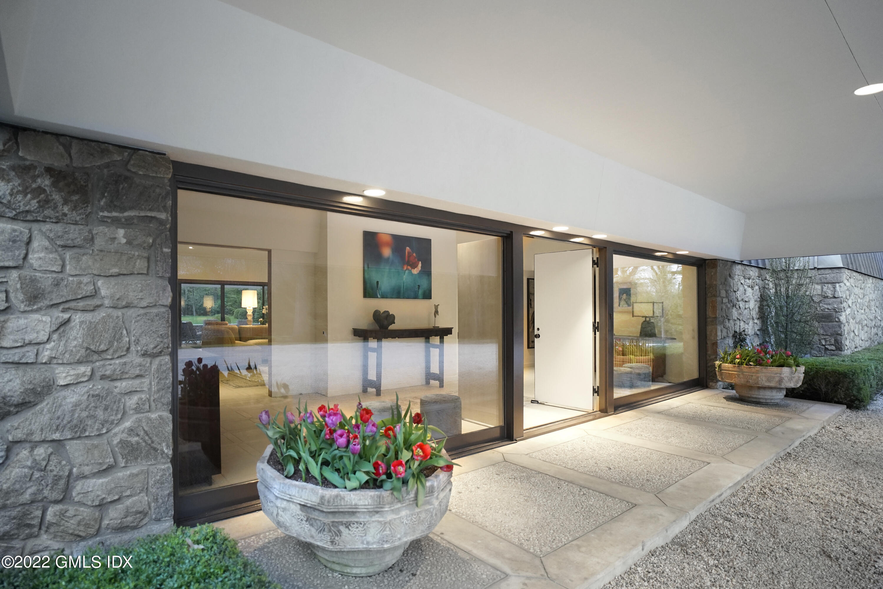 3 North Stanwich Road Greenwich, CT 06831 - Photo 2 of 35 a lobby with furniture and flowers