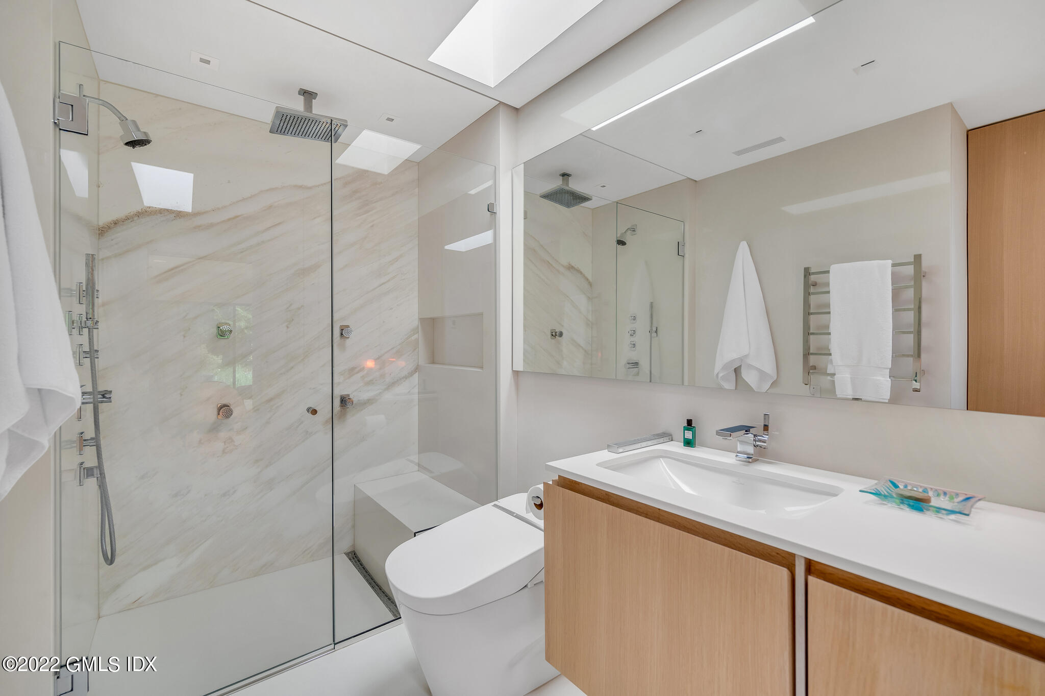 3 North Stanwich Road Greenwich, CT 06831 - Photo 24 of 35 a bathroom with a sink a toilet and shower