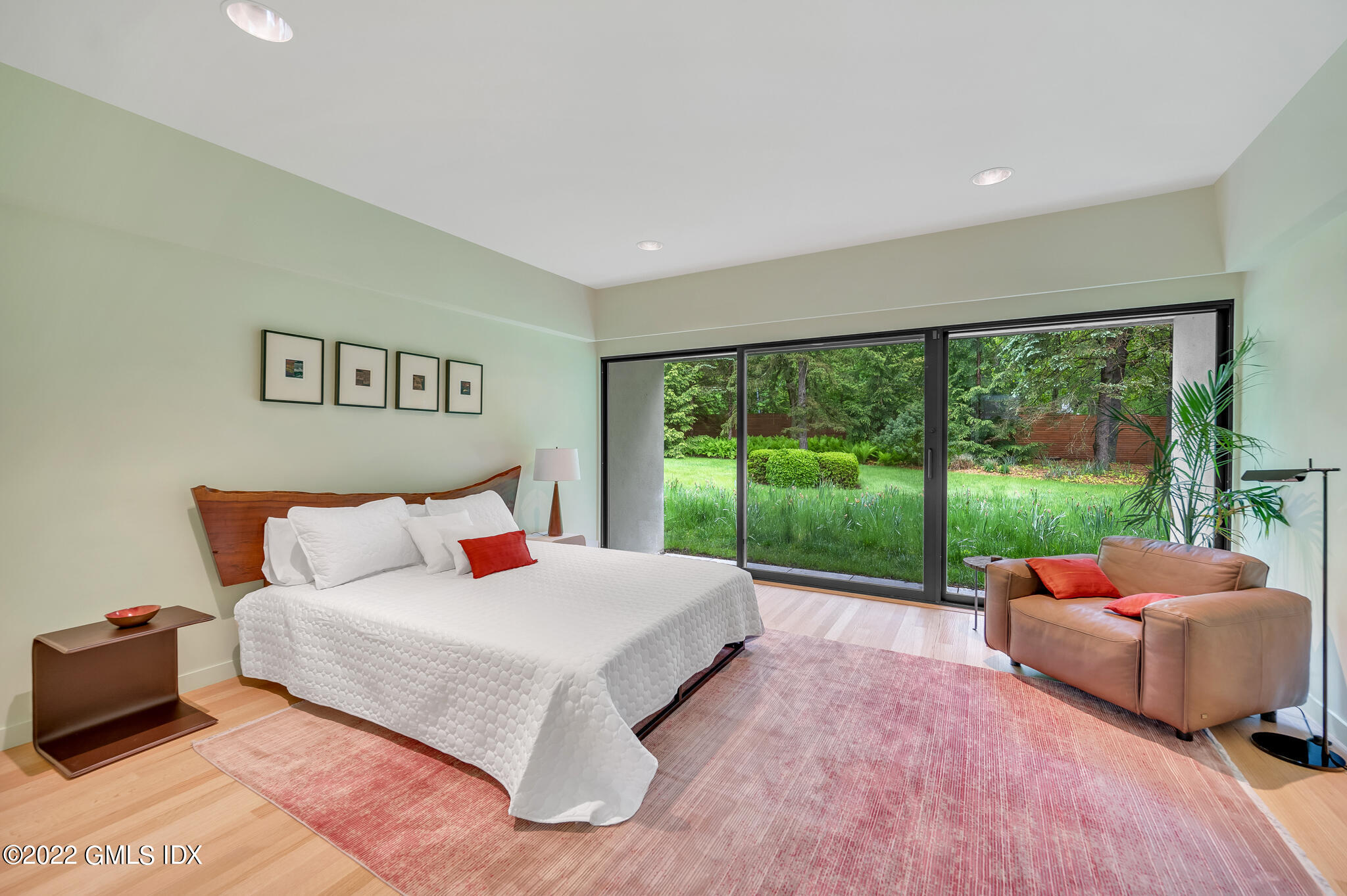 3 North Stanwich Road Greenwich, CT 06831 - Photo 28 of 35 a bed room with a bed and a large window